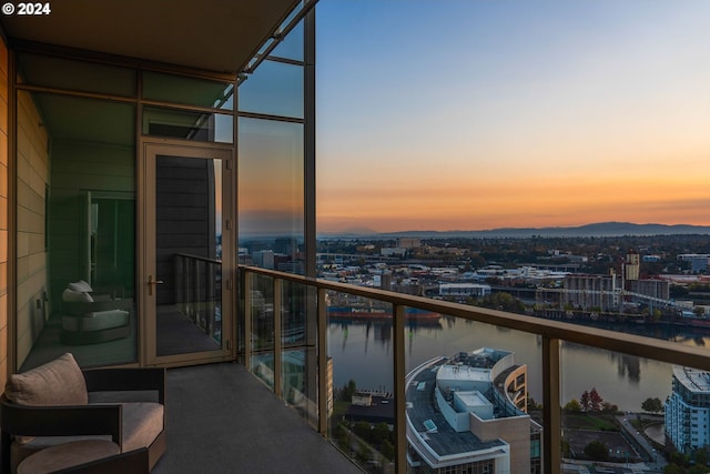 balcony at dusk with a water view