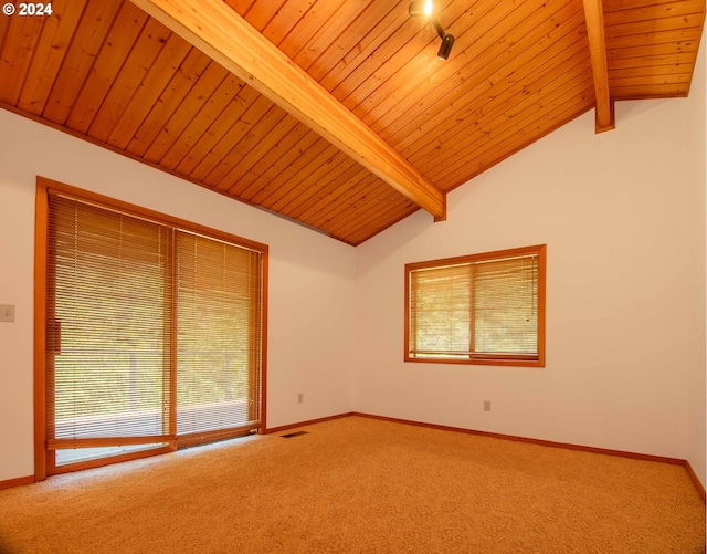 carpeted empty room with vaulted ceiling with beams and wood ceiling