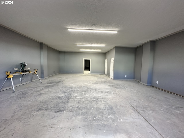 interior space featuring a textured ceiling