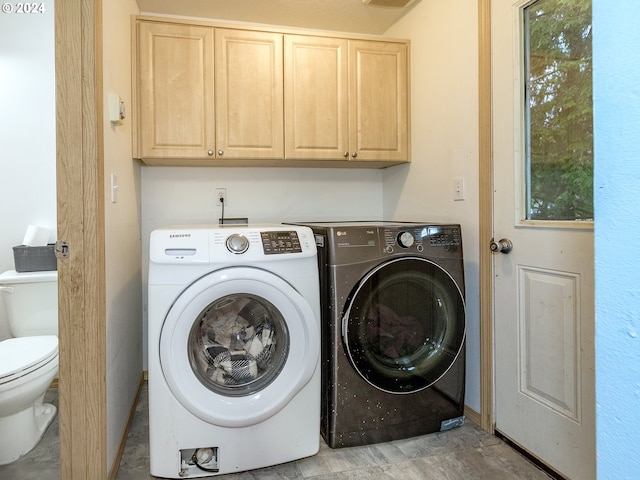 washroom featuring laundry area and independent washer and dryer