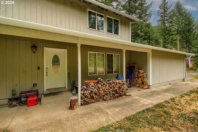 doorway to property featuring a porch