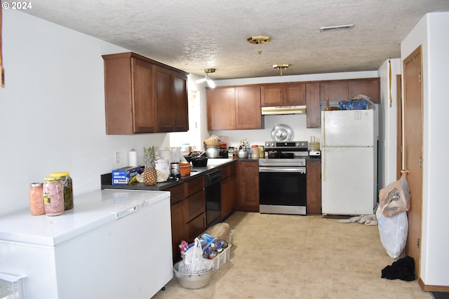 kitchen featuring electric range, a textured ceiling, black dishwasher, refrigerator, and white fridge