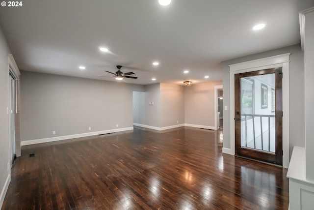 spare room featuring ceiling fan and hardwood / wood-style floors