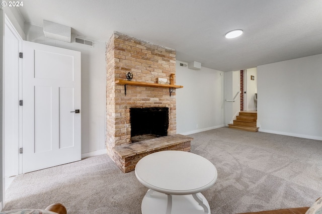 unfurnished living room featuring a fireplace and light carpet