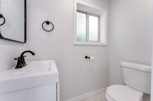 bathroom with sink and toilet