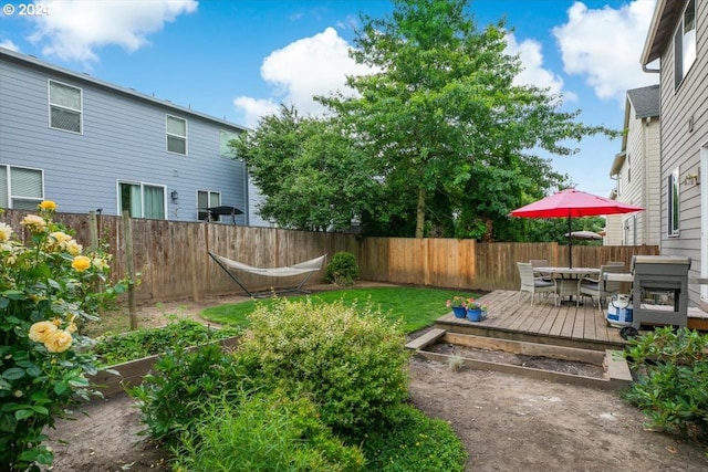 view of yard with a wooden deck