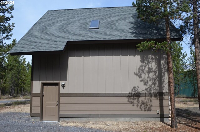 garage with wood walls