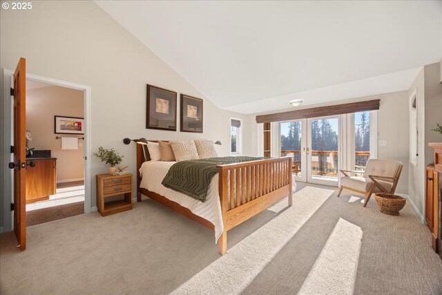 bedroom with access to outside, light carpet, high vaulted ceiling, and french doors