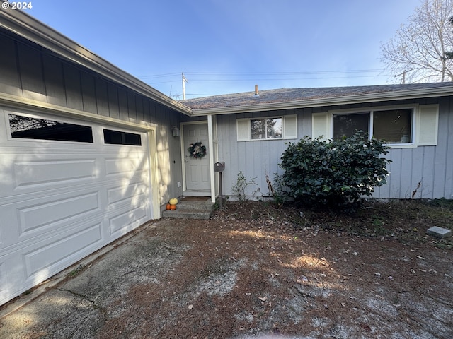 property entrance featuring a garage