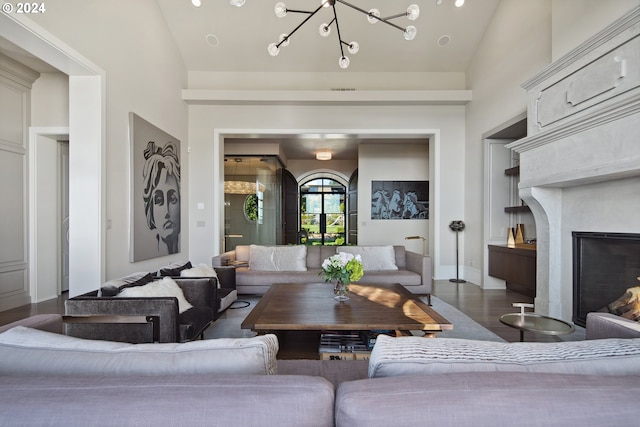 living room featuring high vaulted ceiling