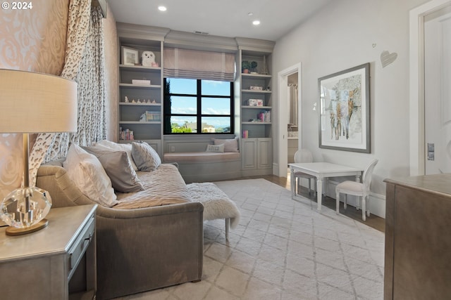 living area with light hardwood / wood-style flooring