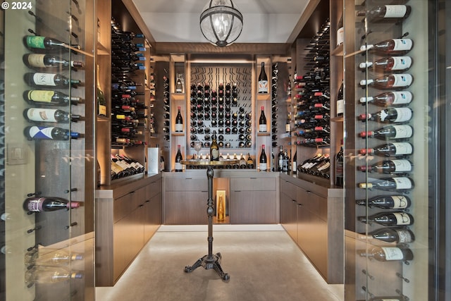 wine room featuring a notable chandelier