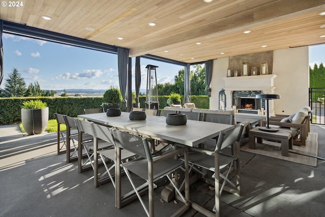 view of patio / terrace with an outdoor fireplace