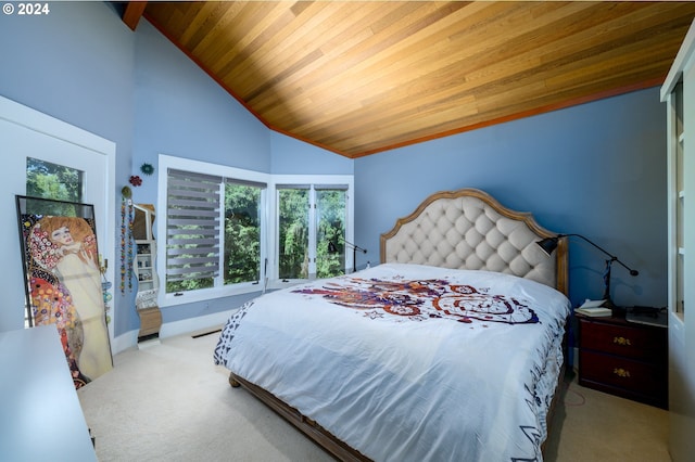 carpeted bedroom with wooden ceiling and lofted ceiling