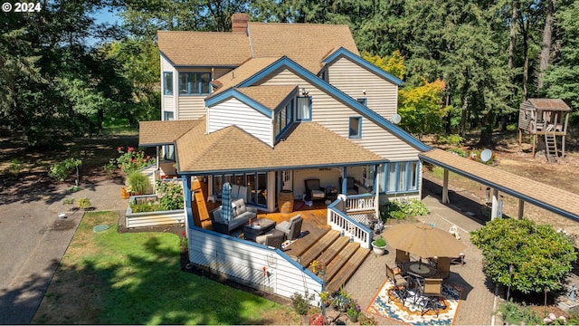 exterior space featuring a wooden deck