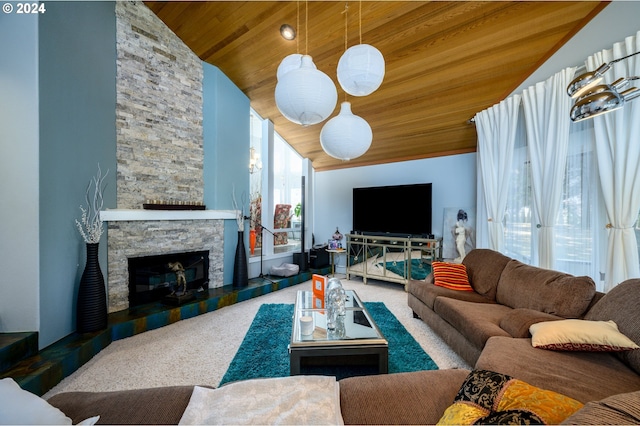 carpeted living room featuring wood ceiling, a stone fireplace, and high vaulted ceiling