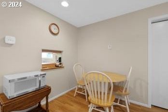 dining room featuring hardwood / wood-style flooring