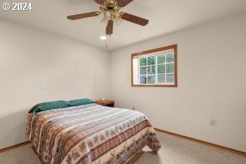 bedroom with carpet and ceiling fan