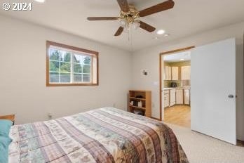 bedroom with carpet and ceiling fan