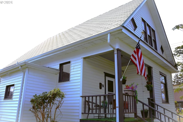 view of home's exterior featuring covered porch