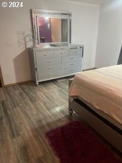 bedroom featuring wood-type flooring