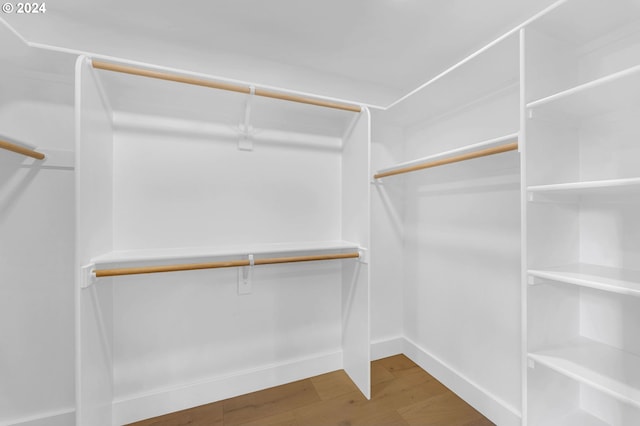 walk in closet featuring wood-type flooring