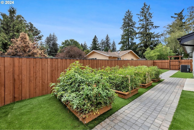 view of yard featuring central AC