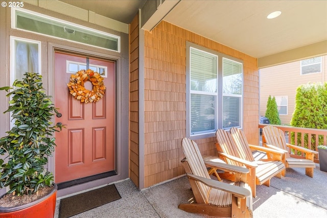 property entrance featuring covered porch