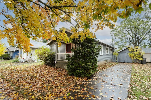 view of front of house with a shed