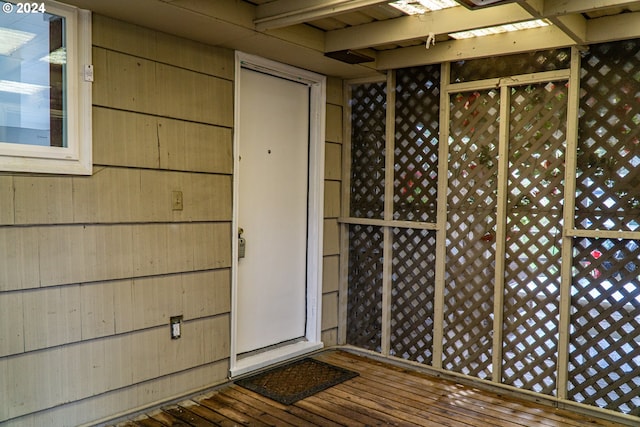 wine cellar featuring wooden walls