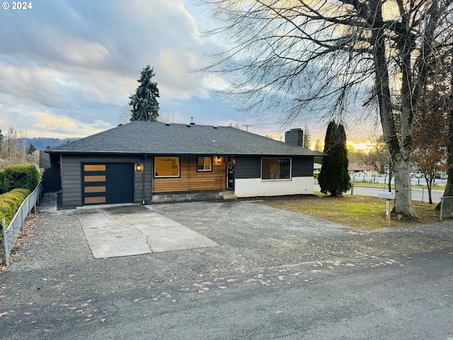 view of front of home with a garage