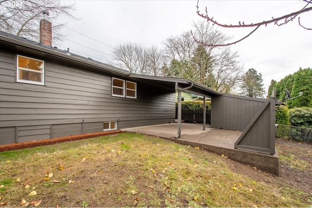 exterior space featuring a yard and a patio