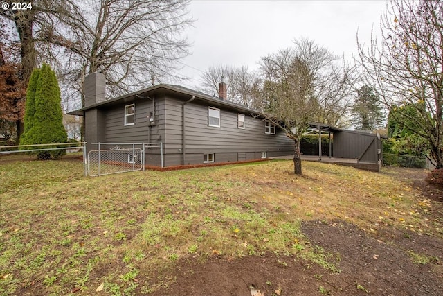 view of home's exterior featuring a yard