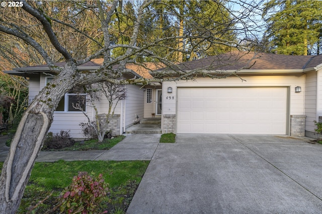 single story home featuring a garage