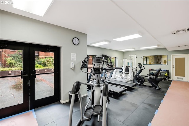 gym featuring french doors