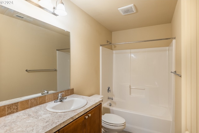 full bathroom featuring vanity, toilet, and bathtub / shower combination