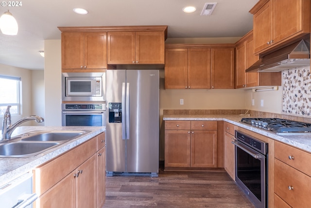 421 Little Lake Rd, Maupin, OR 97037 - kitchen with stainless steel appliances, a sink, under cabinet range hood, dark wood-style floors, and recessed lighting