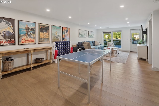 recreation room featuring light hardwood / wood-style flooring