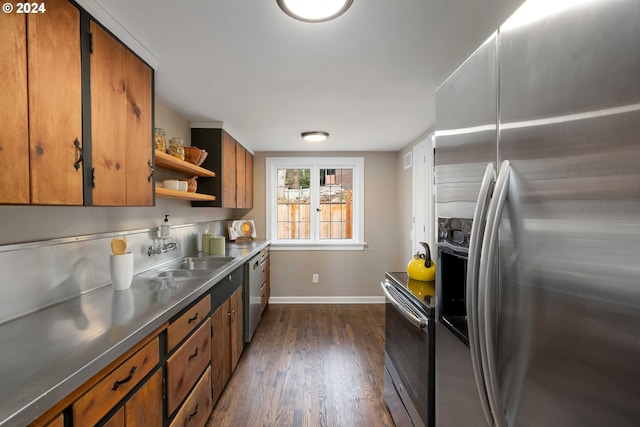 kitchen featuring a sink, stainless steel countertops, open shelves, stainless steel appliances, and brown cabinetry