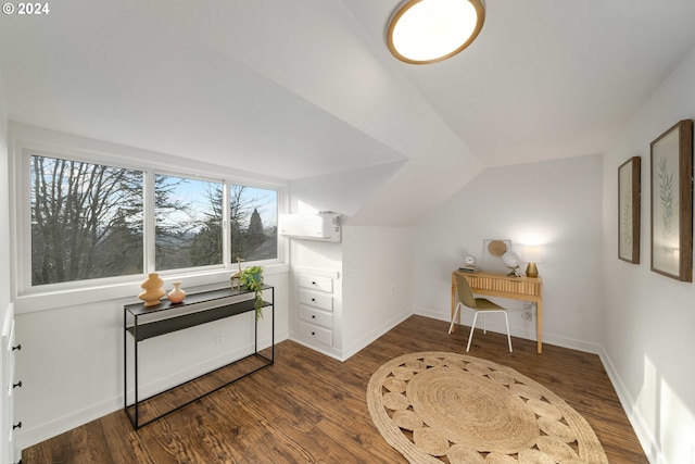 office area with baseboards, lofted ceiling, and wood finished floors