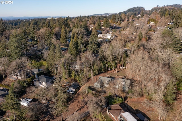 aerial view featuring a view of trees