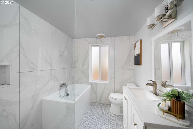 full bathroom with vanity, a bath, plenty of natural light, tile walls, and toilet