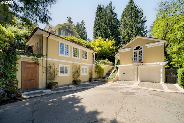 view of front of home with a garage