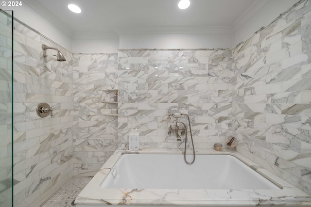 bathroom with ornamental molding and plus walk in shower