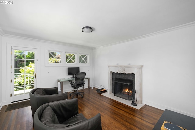 living room featuring a high end fireplace, dark hardwood / wood-style floors, and ornamental molding