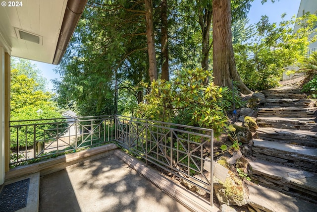 view of patio with a balcony