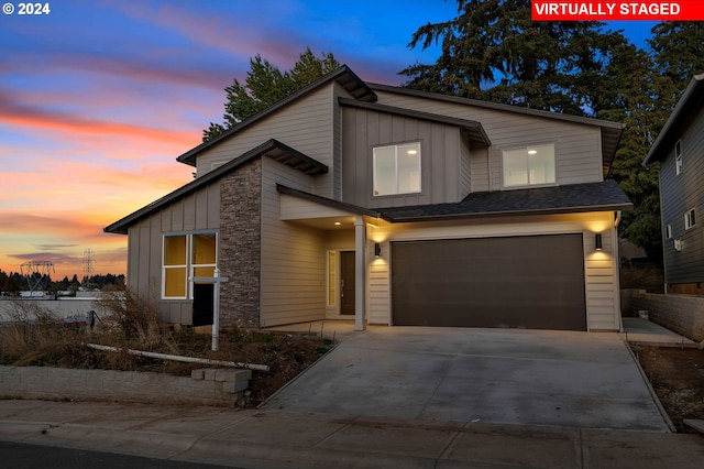 view of front of property featuring a garage