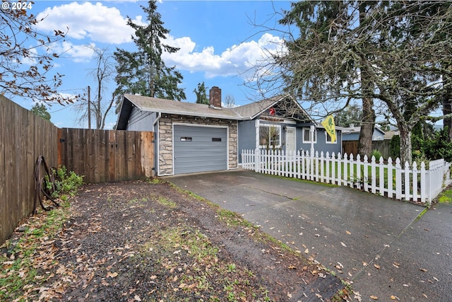 ranch-style home with a garage