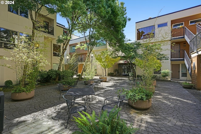 view of home's community featuring a patio