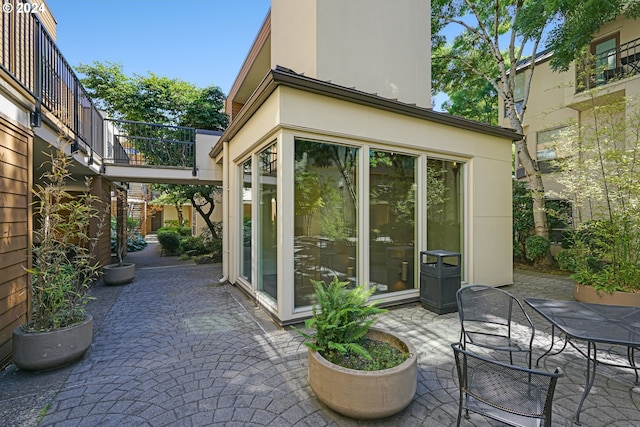 view of patio with a balcony